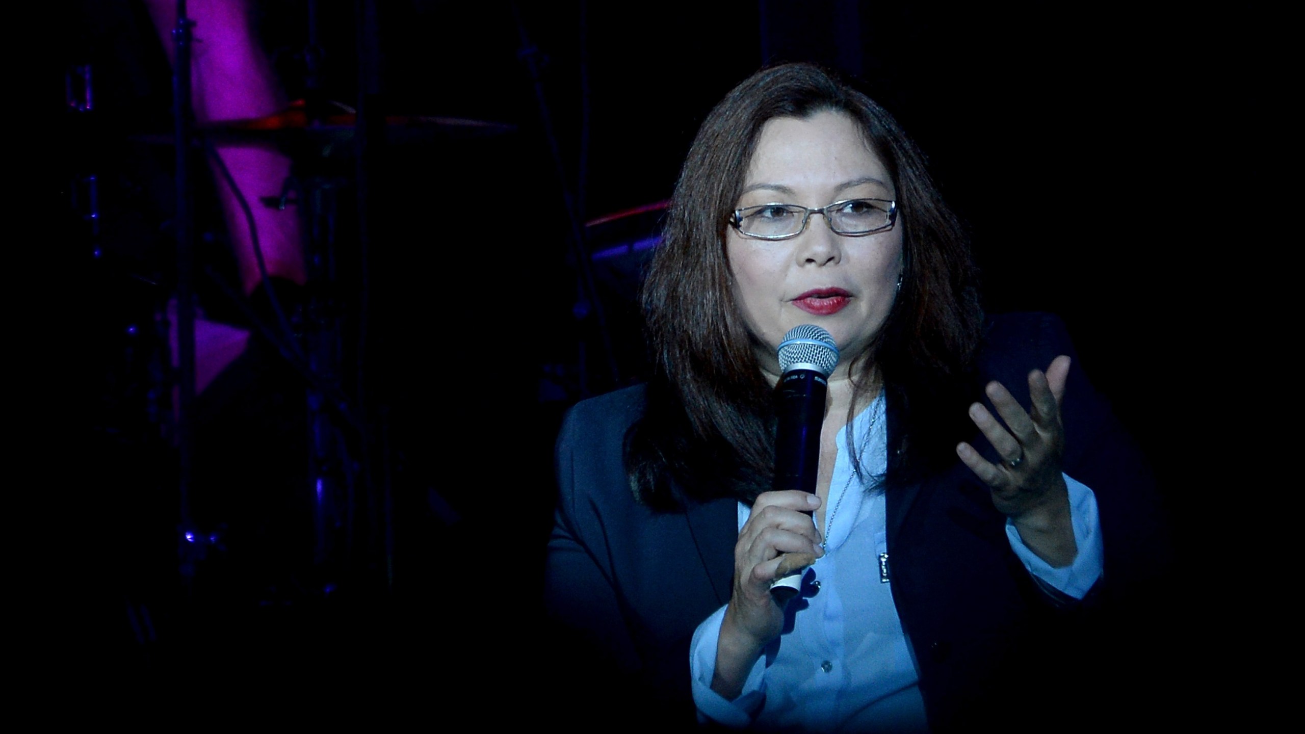 U.S. Senator Tammy Duckworth introduces Joe Walsh at the VetsAid Charity Benefit Concert at Eagle Bank Arena on Sept. 20, 2017 in Fairfax, Virginia. (Credit: Shannon Finney/Getty Images)