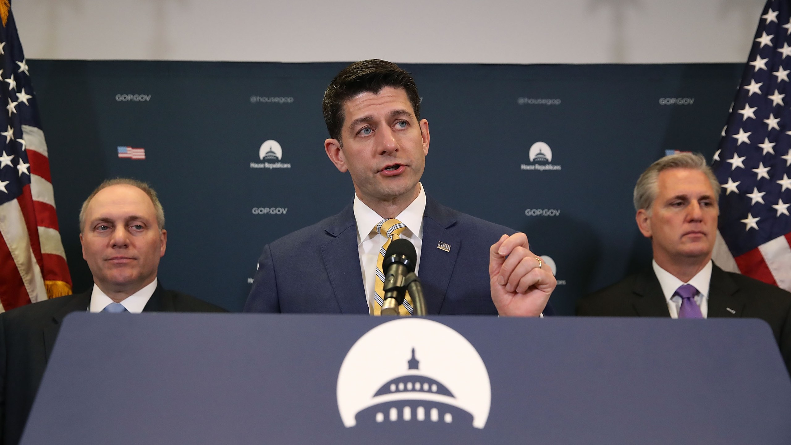 House Speaker Paul Ryan (R-WI), (center), speaks to the media while flanked by House Majority Leader Kevin McCarthy (R-CA), (right), and House Majority Whip, Steve Scalise (R-LA) (left), after a meeting with House Republicans on Capitol Hill, on March 6, 2018 in Washington, DC. (Credit: Mark Wilson/Getty Images)