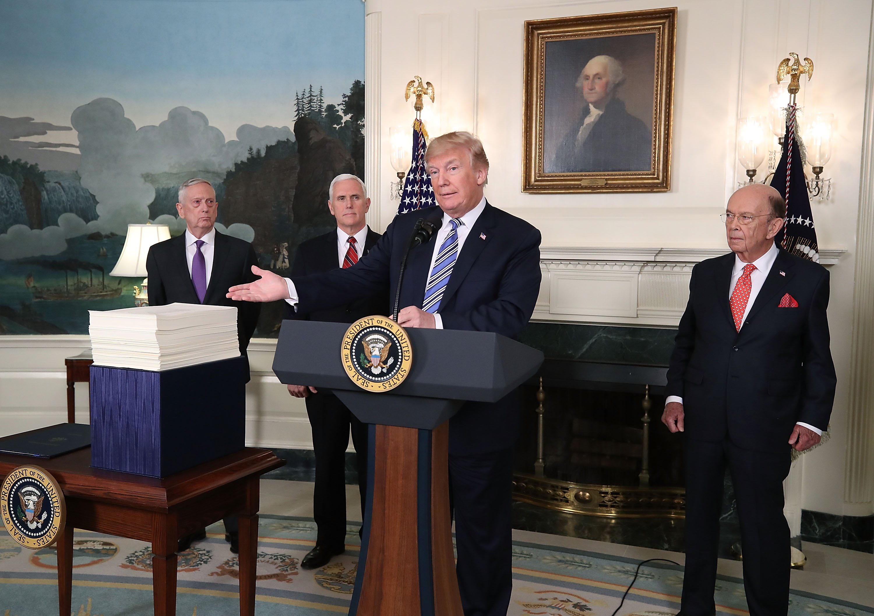 Donald Trump speaks to the press about the $1.3 trillion spending bill passed by Congress on March 23, 2018. (Credit: Mark Wilson/Getty Images)