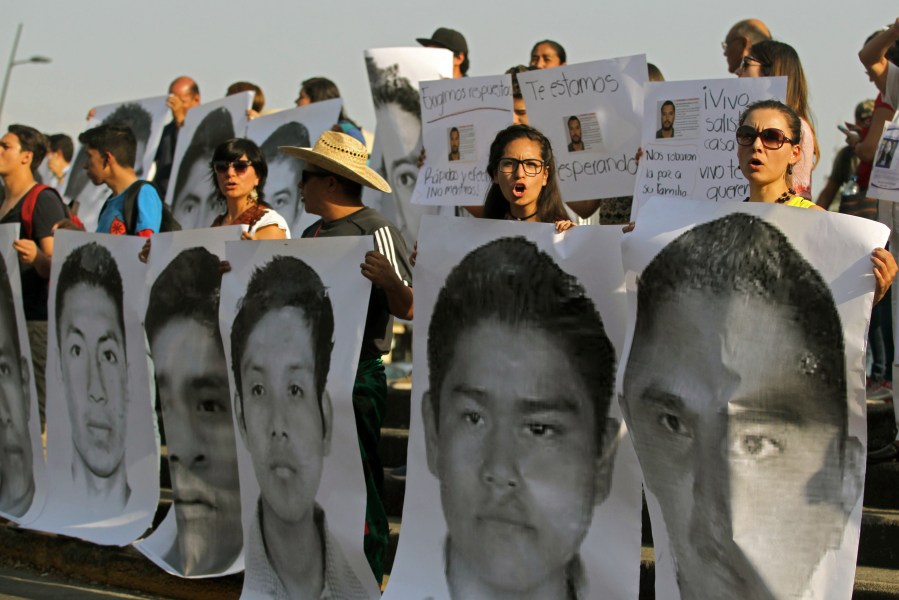 Relatives and friends of three missing students from the University of Audiovisual Media, take part in a demonstration demanding their loved ones to return alive, at the "Ninos heroes" roundabout in Guadalajara, Jalisco State, Mexico, on April 19, 2018. (Credit: ULISES RUIZ/AFP/Getty Images)