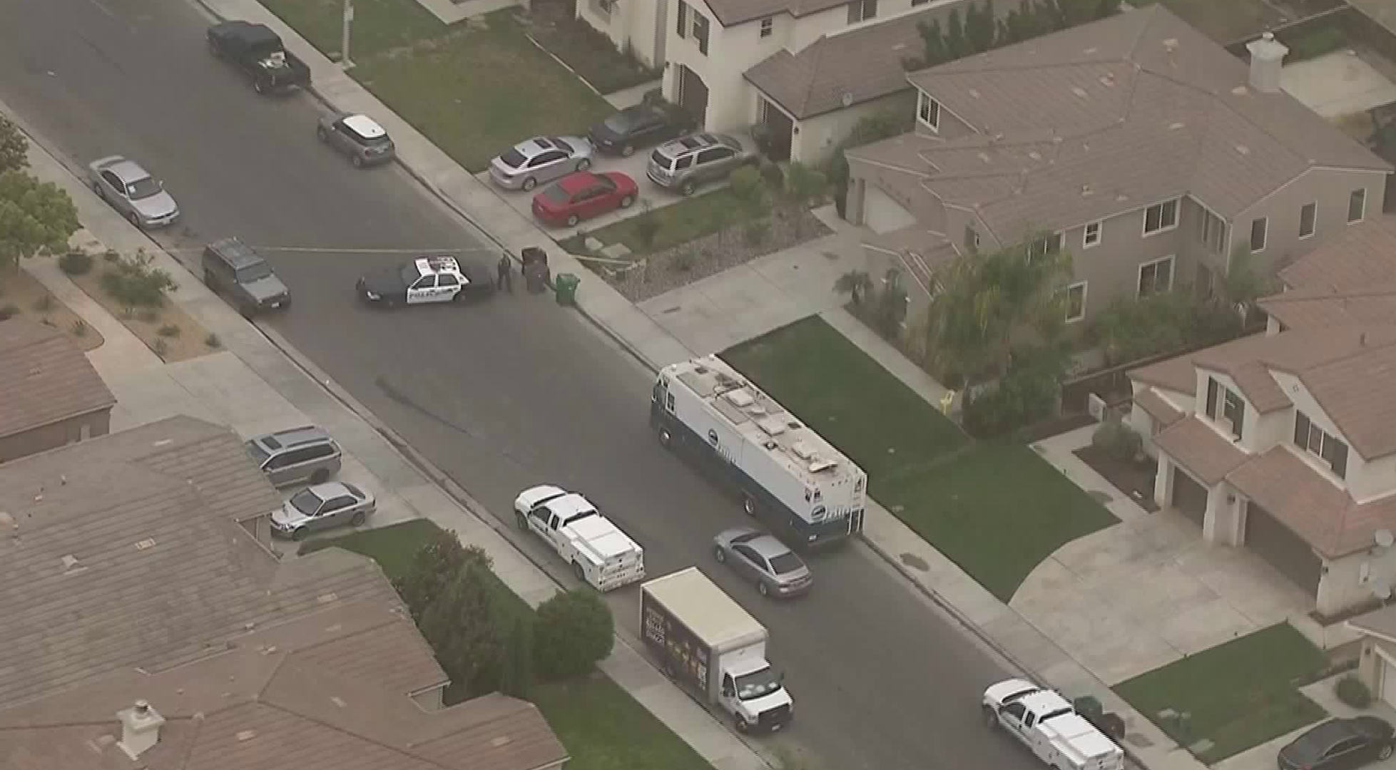 Police cordon off the scene of a homicide investigation in Moreno Valley on April 27, 2018. (Credit: KTLA)