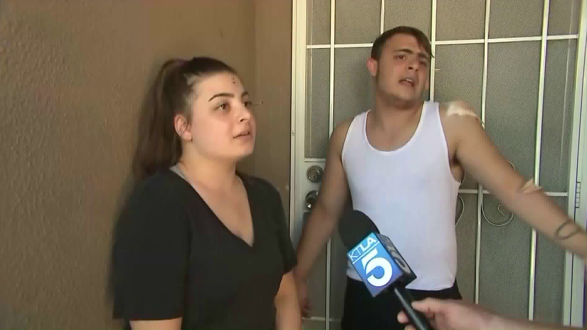 Christina and Harry Nalbandyan, from left, are seen outside their home in Panorama City on April 25, 2018. (Credit: KTLA)