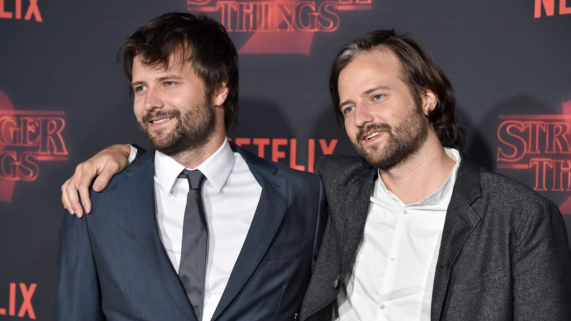 Creators Ross Duffer (L) and Matt Duffer attend the premiere of Netflix's "Stranger Things" Season 2 at Regency Bruin Theatre on October 26, 2017 in Los Angeles. (Credit: Frazer Harrison/Getty Images)