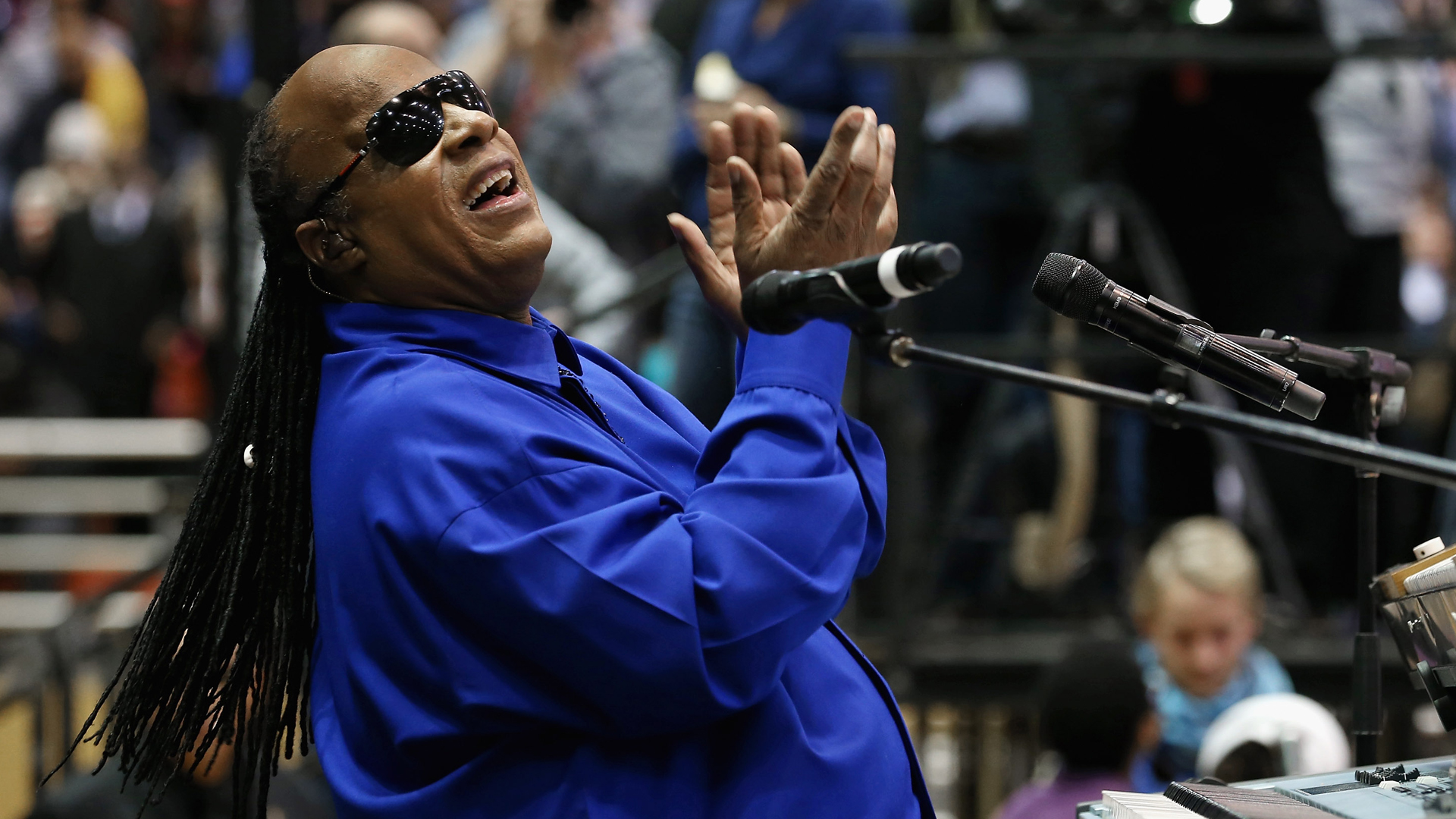 Stevie Wonder warms up the crowd during a campaign rally for President Barack Obama at Fifth Third Arena Nov. 4, 2012, in Cincinnati, Ohio. (Credit: Chip Somodevilla/Getty Images)