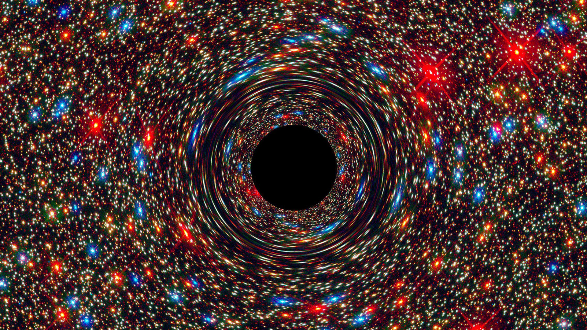 The black hole is growing so fast it can devour a mass the size of the sun every two days. (CREDIT: NASA/ESA/D. Coe., J. Anderson, and R. Van Der Marel (STSCI))