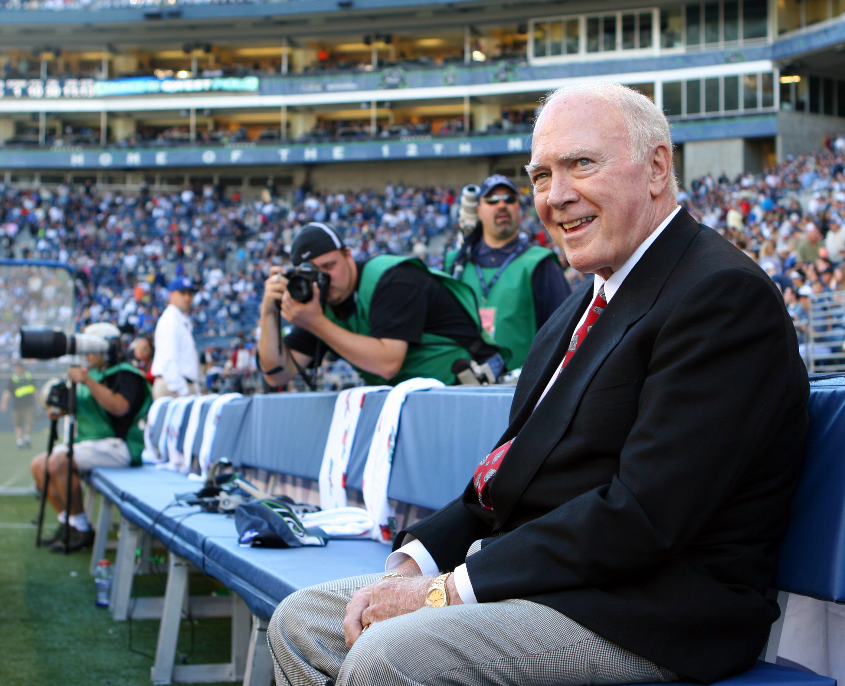 Former Los Angeles Rams and Seattle Seahawks head coach Chuck Knox waits on the bench before he is honored at halftime by the Seahawks on Sept. 24 2005. (Credit: Kevin Casey/ NFLPhotoLibrary via Getty Images)