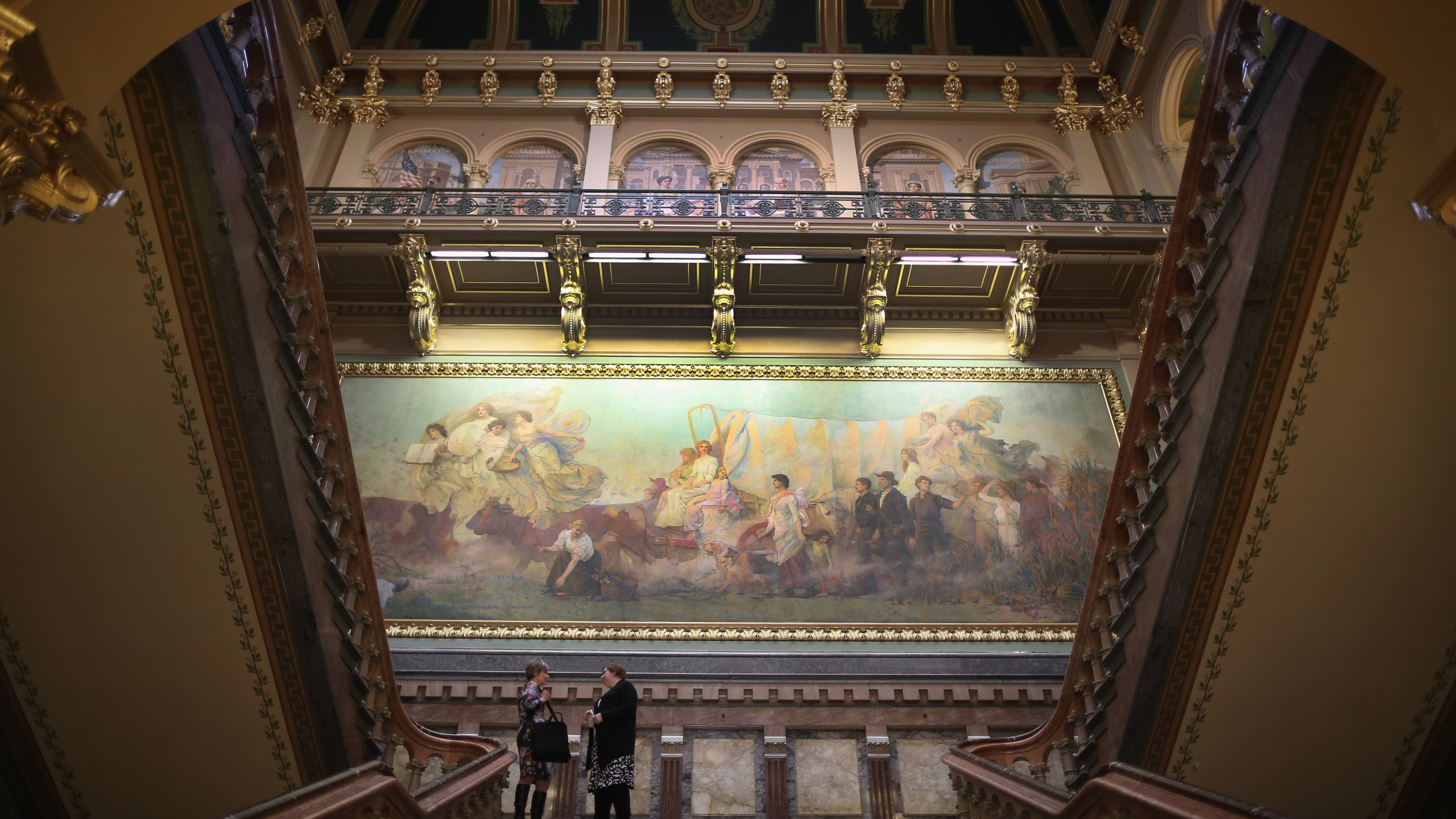 Two people are seen in the Iowa State Capitol building on Jan. 27, 2016 in Des Moines. (Credit: Christopher Furlong/Getty Images)