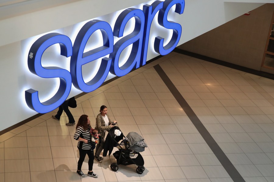 People shop at a Sears store on March 22, 2017 in Schaumburg, Illinois. (Credit: Scott Olson/Getty Images)