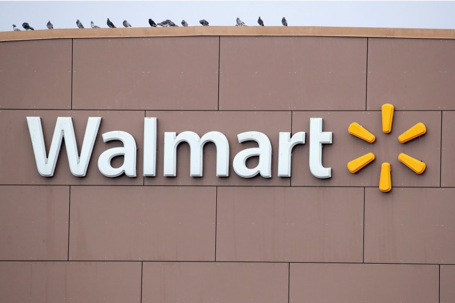 A sign hangs outside Walmart store on January 11, 2018, in Chicago, Illinois. (Credit: Scott Olson/Getty Images)