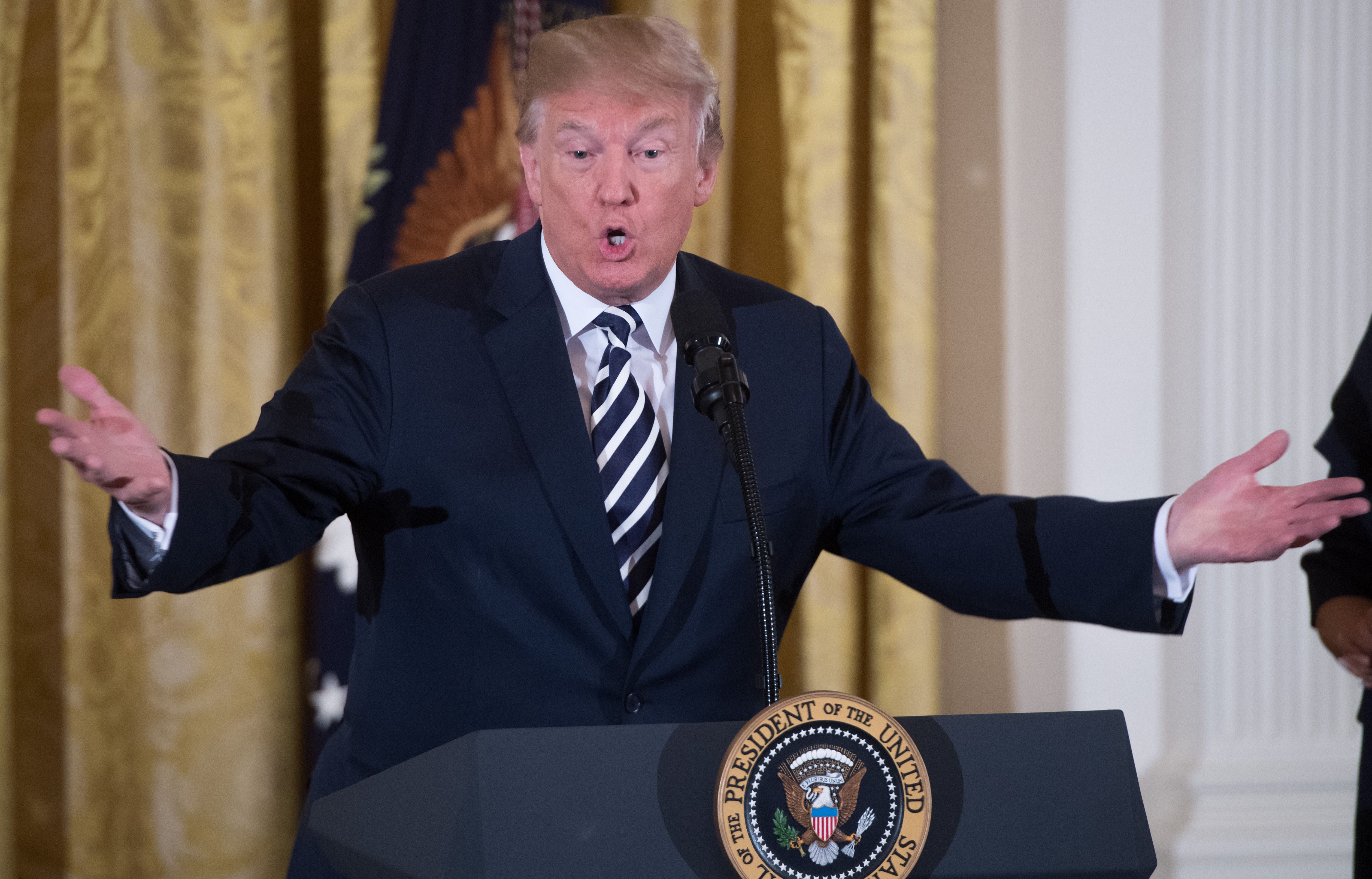 President Donald Trump speaks during an event in honor of military mothers and spouses in the East Room of the White House on May 9, 2018. (Credit: Saul Loeb / AFP / Getty Images)