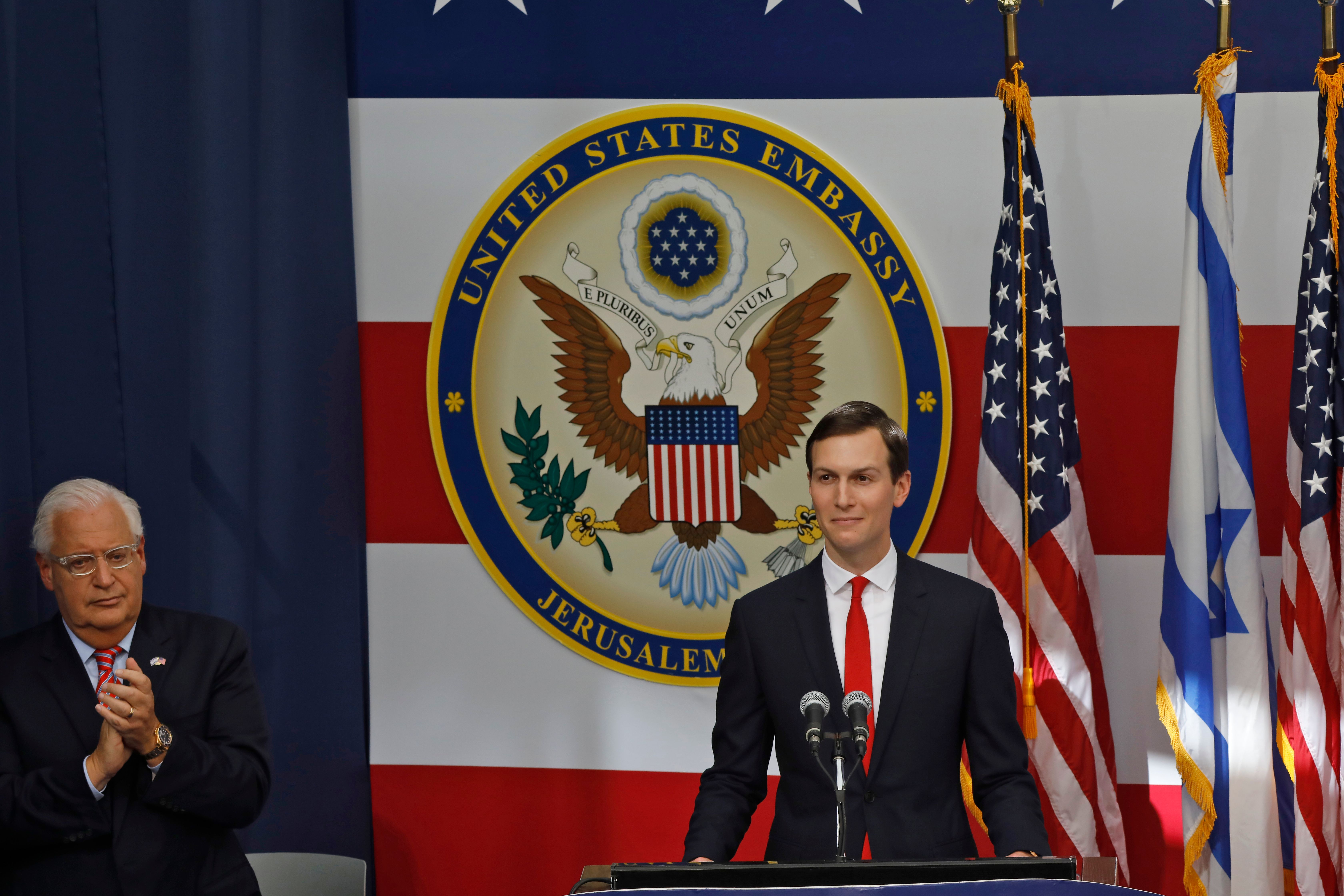 US ambassador to Israel David Friedman claps as Senior White House Advisor Jared Kushner delivers a speech during the opening of the US embassy in Jerusalem on May 14, 2018. (Credit: MENAHEM KAHANA/AFP/Getty Images)