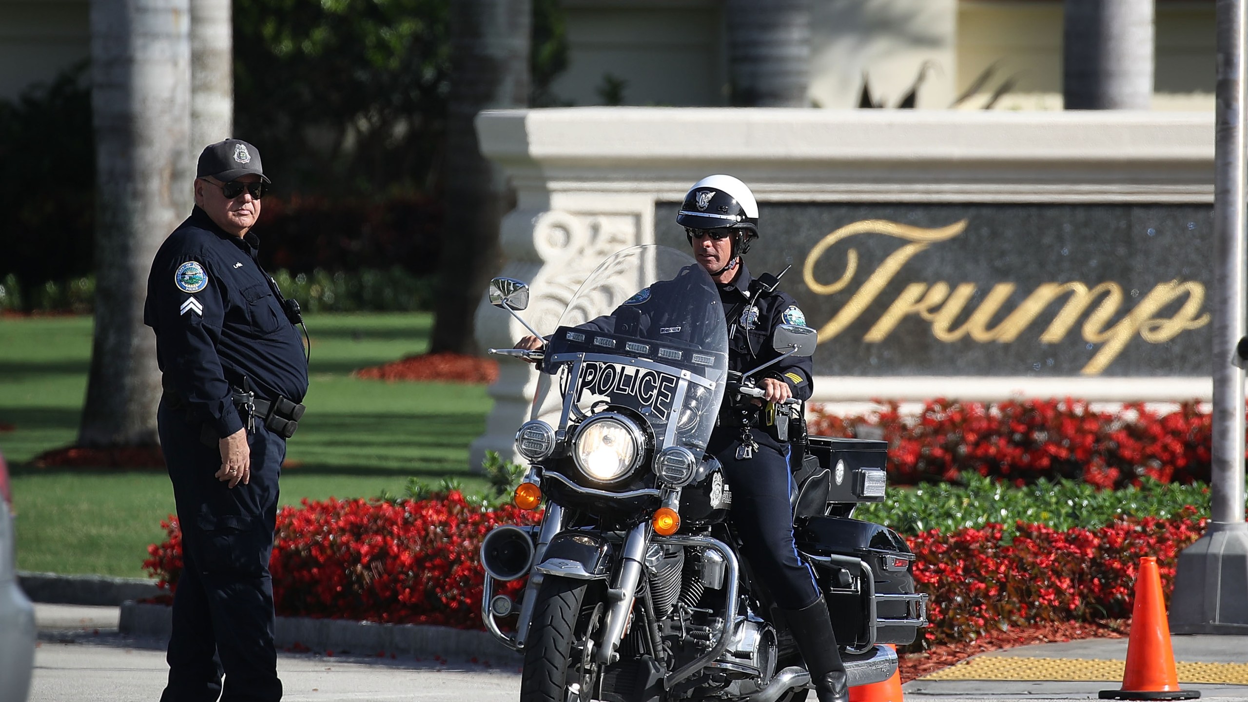 Police block off the entrance to the Trump National Doral Miami resort on May 18, 2018, in Doral, Florida. Law enforcement officials said that a man opened fire early Friday morning in the lobby of the resort and was shouting "anti-Trump rhetoric," before he was shot and wounded by police. (Credit: Joe Raedle/Getty Images)