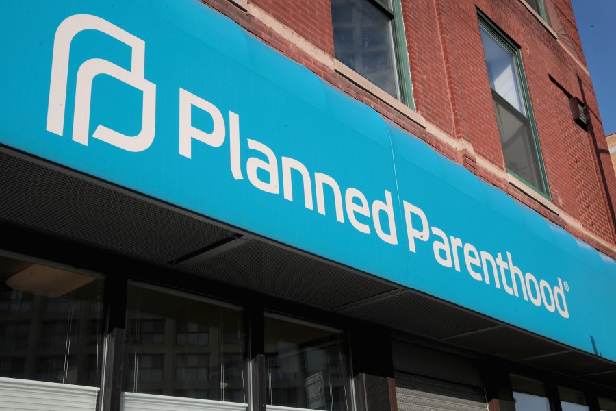 A sign hangs above a Planned Parenthood clinic on May 18, 2018 in Chicago, Illinois. (Credit: Scott Olson/Getty Images)