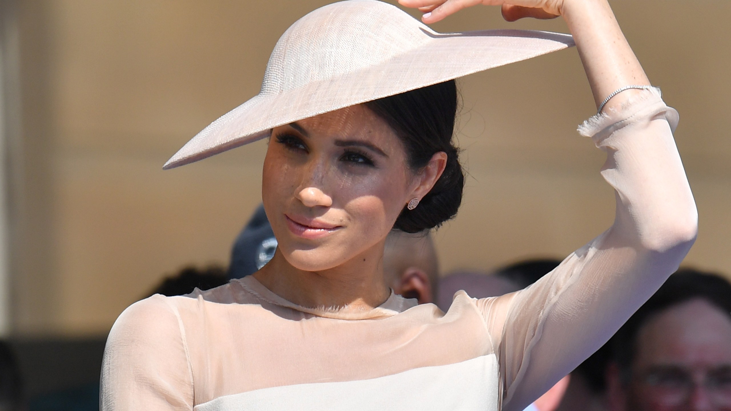 Meghan, Duchess of Sussex, attends The Prince of Wales' 70th birthday celebration at Buckingham Palace on May 22, 2018. (Credit: Dominic Lipinski / Getty Images)