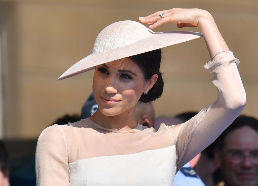 Meghan, Duchess of Sussex, attends The Prince of Wales' 70th birthday celebration at Buckingham Palace on May 22, 2018. (Credit: Dominic Lipinski / Getty Images)