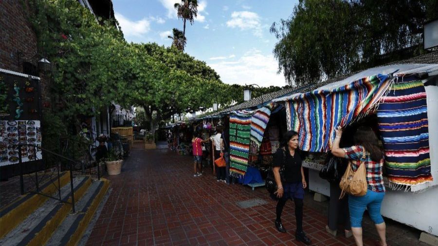 Visitors to El Pueblo de Los Angeles in downtown Los Angeles are shown in this 2015 file photo. (Credit: Mel Melcon/Los Angeles Times)