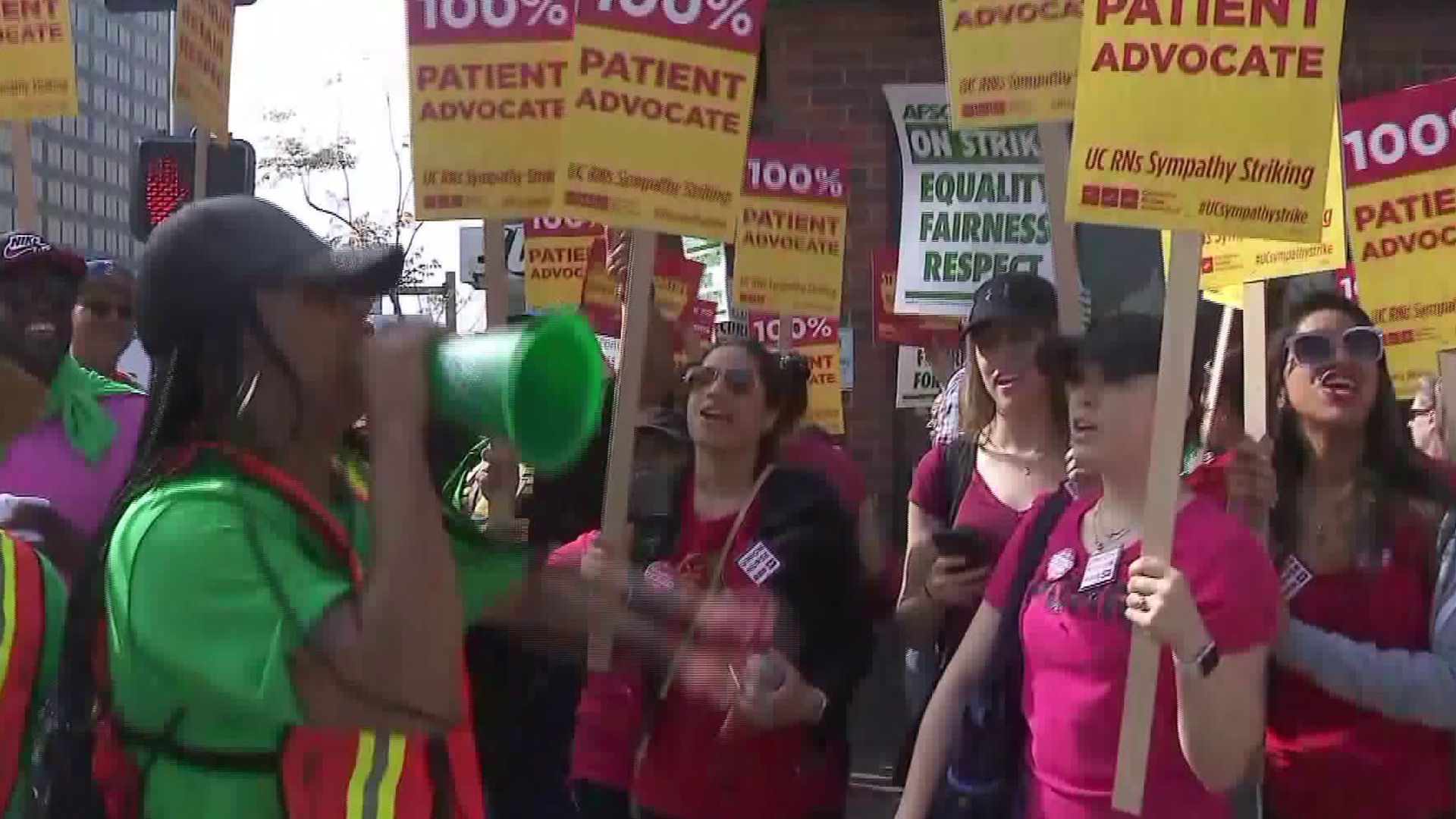 UC workers and other protesters rally at the UCLA campus in Westwood on May 8, 2018. (Credit: KTLA)