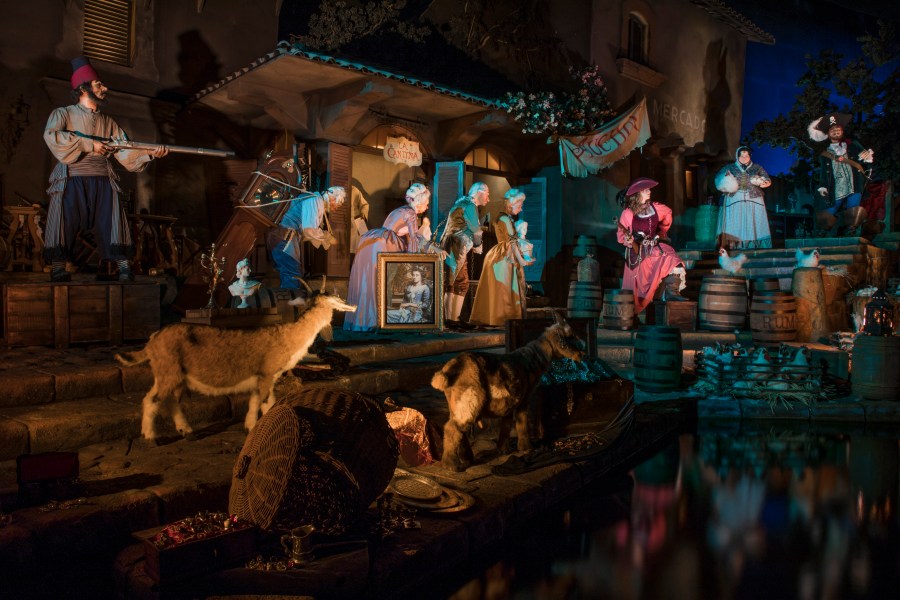 An image provided by Disney on July 8, 2018 shows a scene from the newly reopened Pirates of the Caribbean ride, which now features a female character named Redd who "switched sides to become a pirate who's pillaged the town’s rum supply. (Credit: Joshua Sudock/Disneyland Resort)