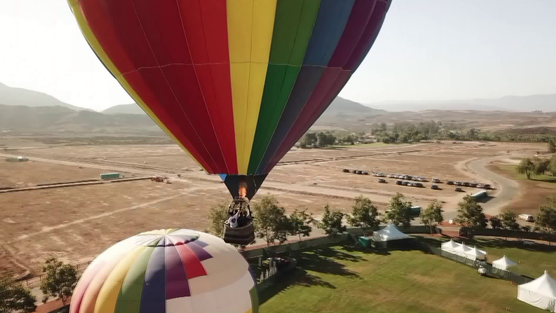 An image from Drone5 shows hot air balloons at the Temecula Valley Balloon and Wine Festival on June 1, 2018. (KTLA)