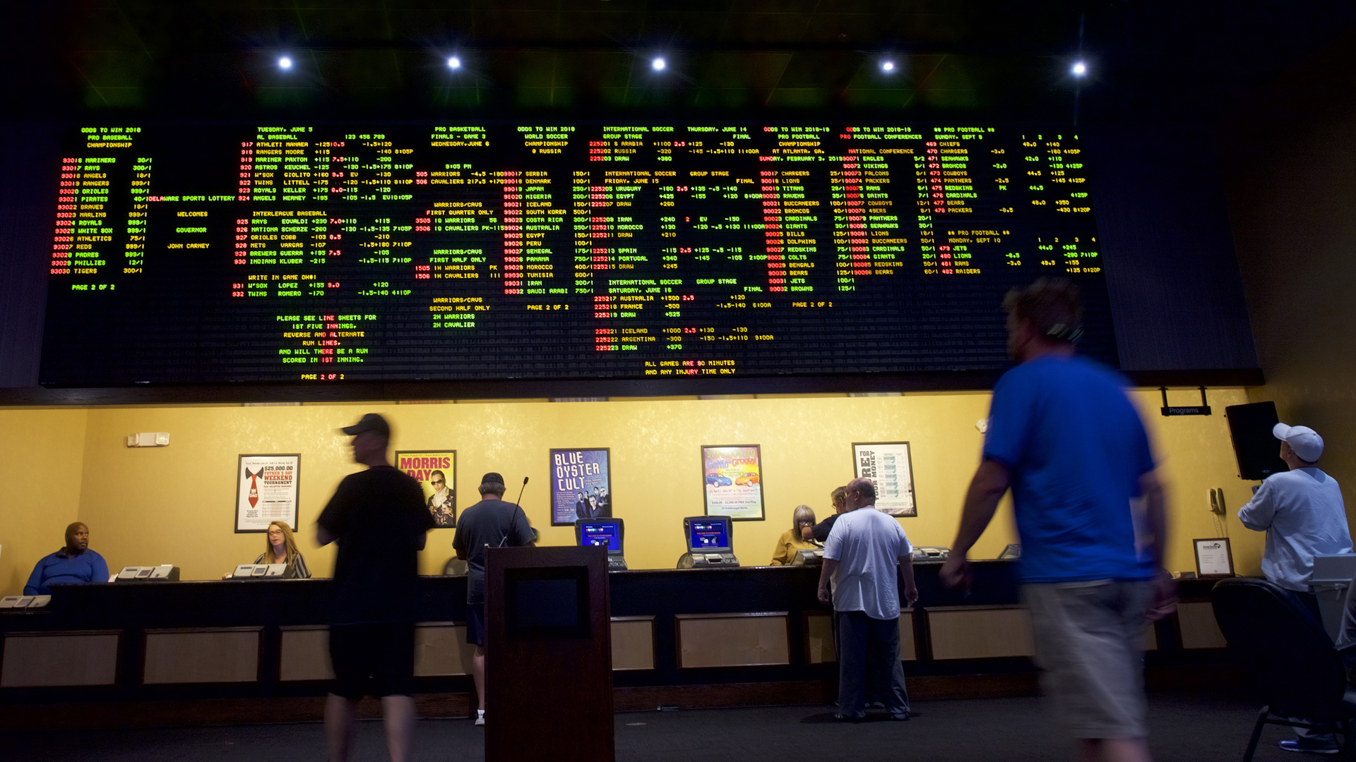 People place bets at Dover Downs Casino on June 5, 2018 in Dover, Delaware. (Credit: Mark Makela/Getty Images)