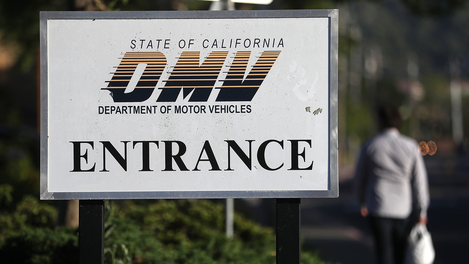 A sign is posted in front of a California Department of Motor Vehicles (DMV) office on May 9, 2017 in Corte Madera. (Credit: Justin Sullivan/Getty Images)