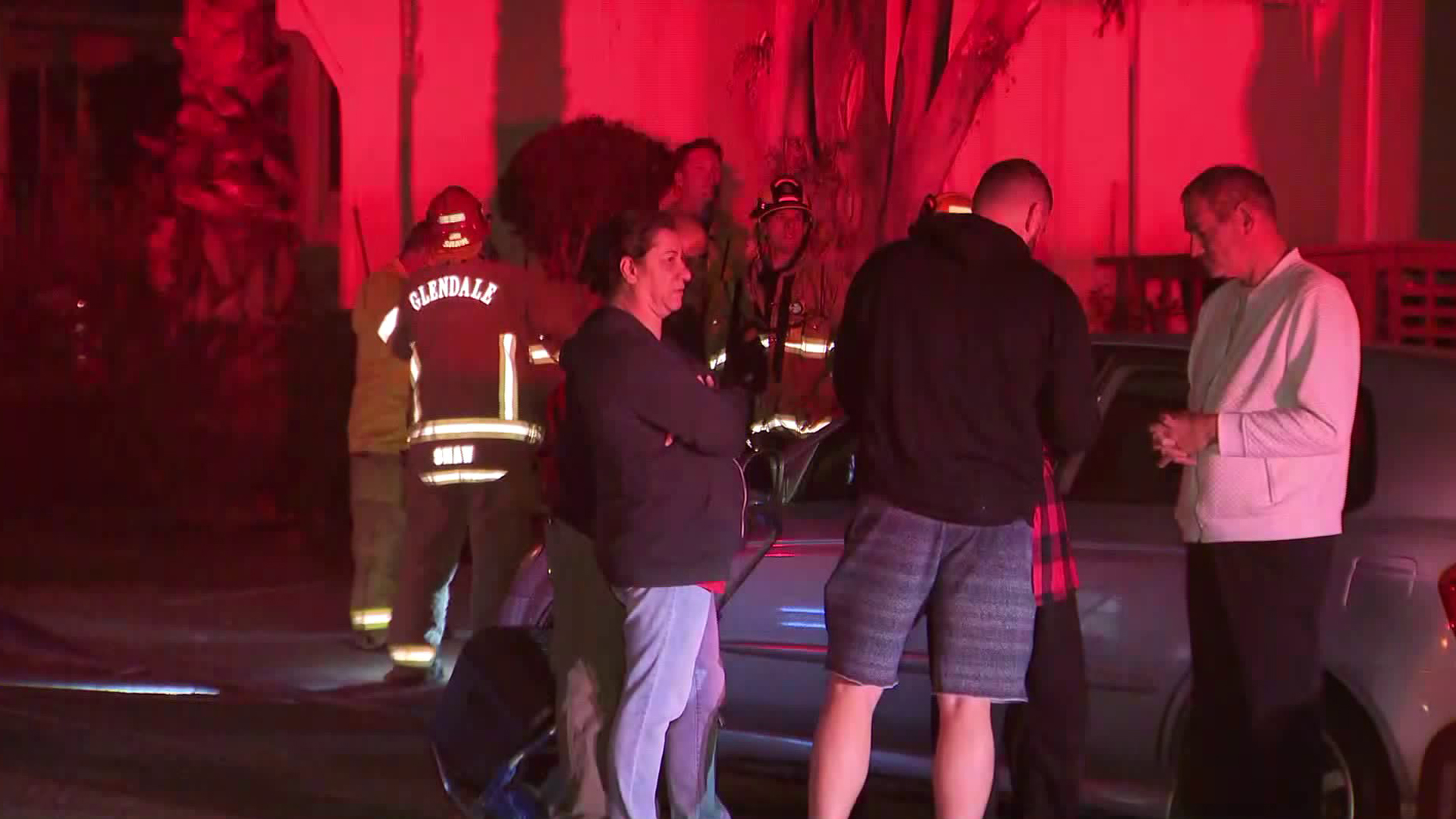 Residents stand in the street after a natural gas explosion in Glendale on June 16, 2018. (Credit: KTLA)