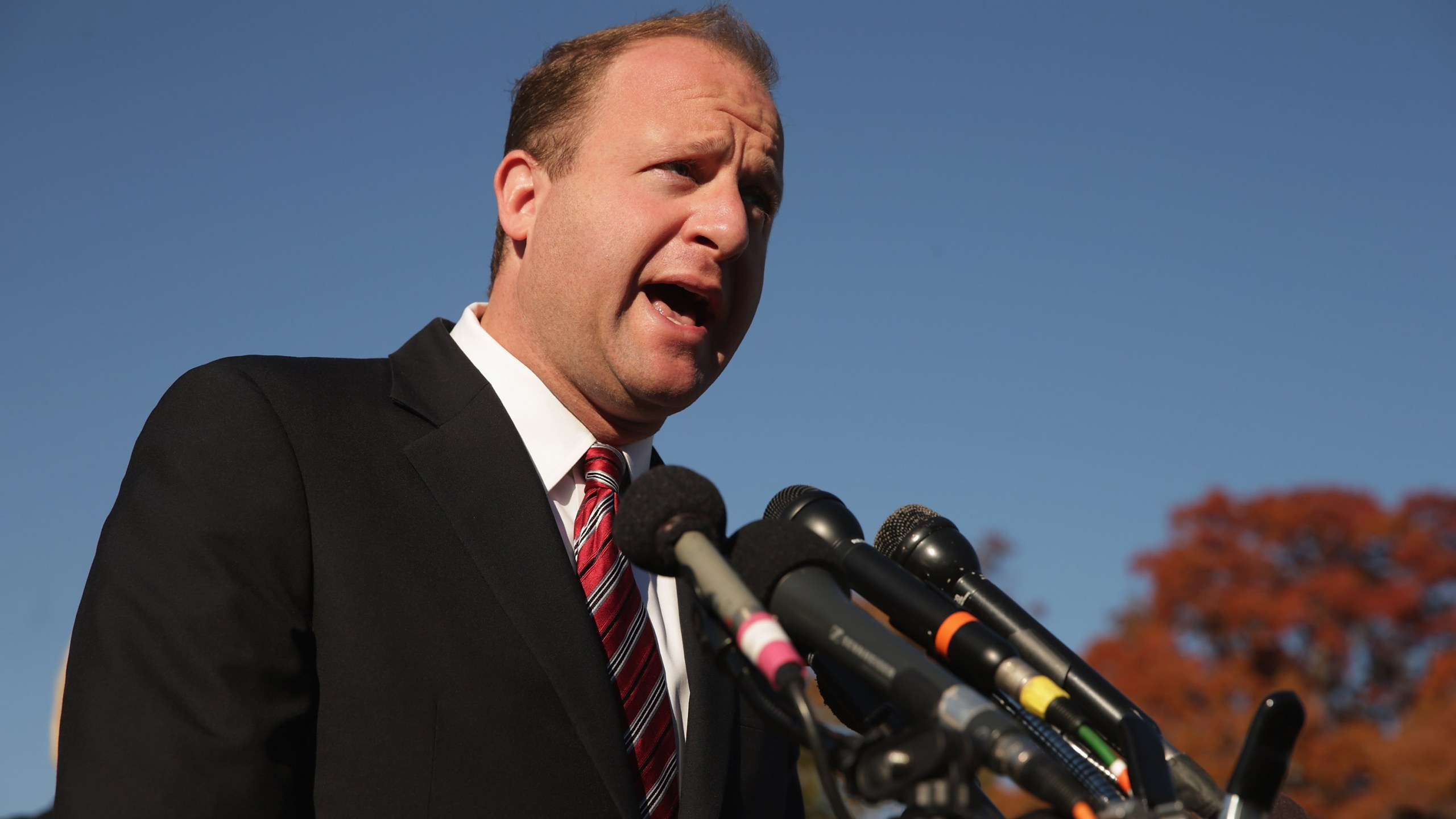 Rep. Jared Polis (D-CO) joins veterans, service members and aspiring recruits to call on Congress and President Barack Obama to move forward with immigration reform at the U.S. Capitol on Nov. 12, 2014. (Credit: hip Somodevilla/Getty Images)