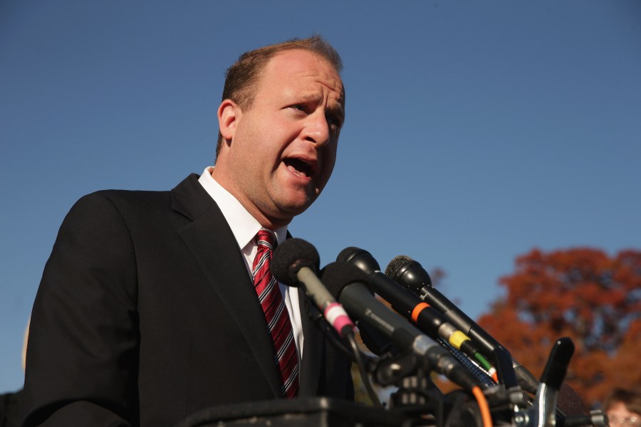 Rep. Jared Polis (D-CO) joins veterans, service members and aspiring recruits to call on Congress and President Barack Obama to move forward with immigration reform at the U.S. Capitol on Nov. 12, 2014. (Credit: hip Somodevilla/Getty Images)