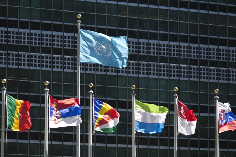 International flags fly in front of the United Nations headquarters on September 24, 2015, before the start of the 70th General Assembly meeting. (Credit: Dominick Reuter/AFP/Getty Images)