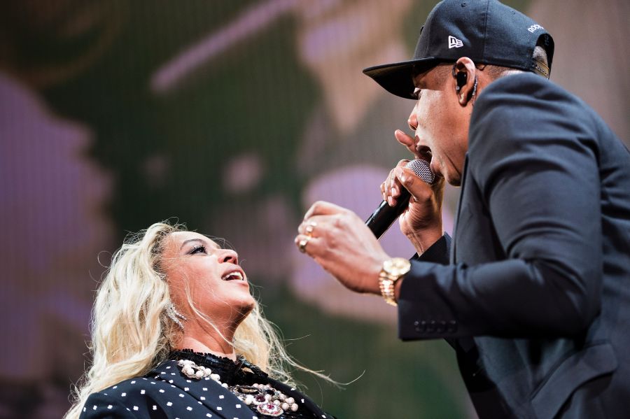 Beyonce and Jay-Z perform during a Get Out the Vote (GOTV) performance in support of Democratic presidential nominee Hillary Clinton at the Wolstein Center Nov. 4, 2016, in Cleveland, Ohio. (Credit: BRENDAN SMIALOWSKI/AFP/Getty Images)