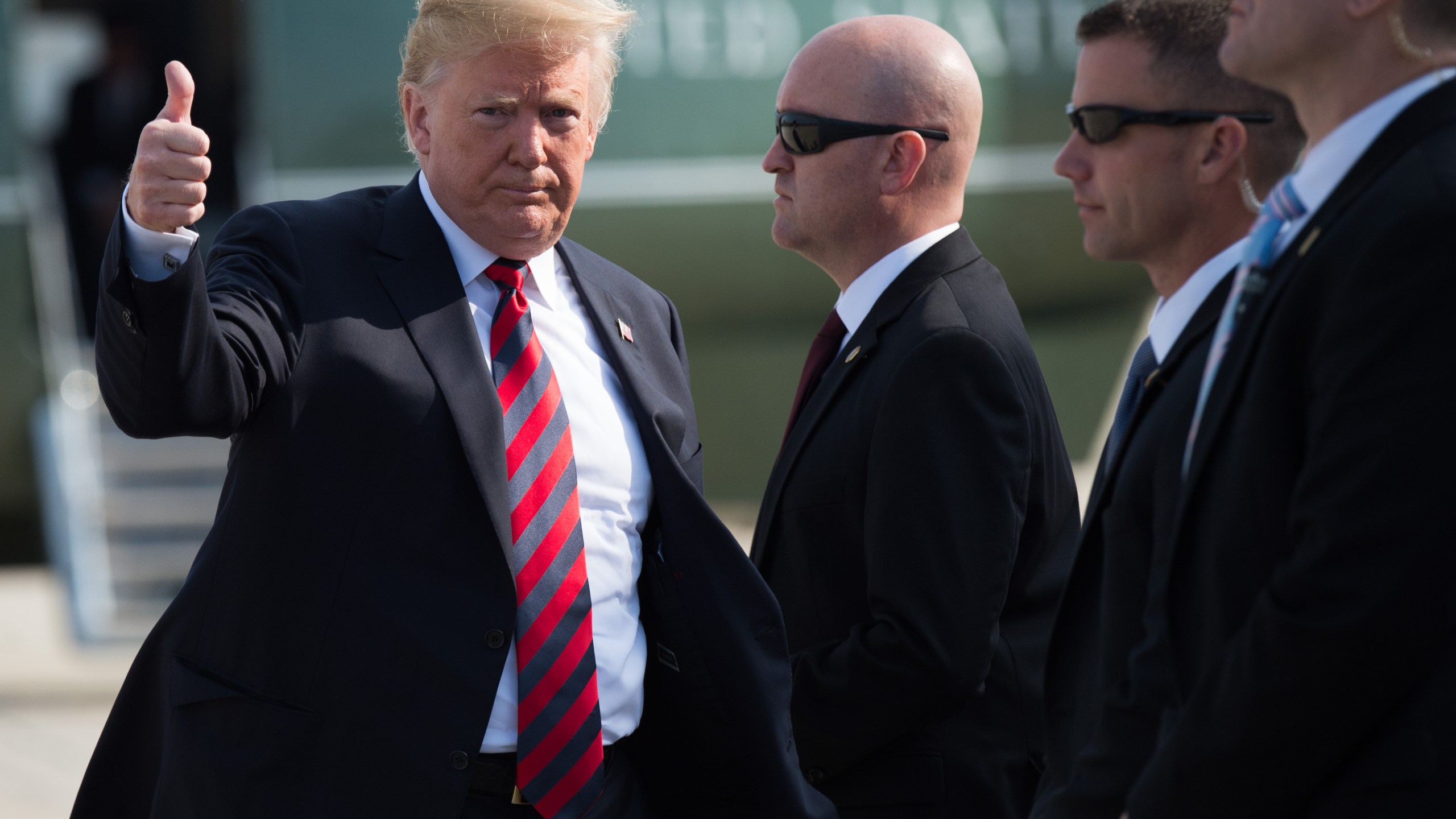 Donald Trump walks to Air Force One prior to departure from Joint Base Andrews in Maryland on June 8, 2018. (Credit: Saul Loeb/AFP/Getty Images)