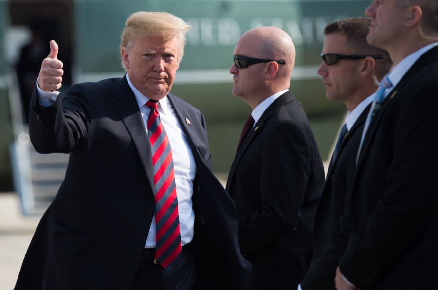 Donald Trump walks to Air Force One prior to departure from Joint Base Andrews in Maryland on June 8, 2018. (Credit: Saul Loeb/AFP/Getty Images)