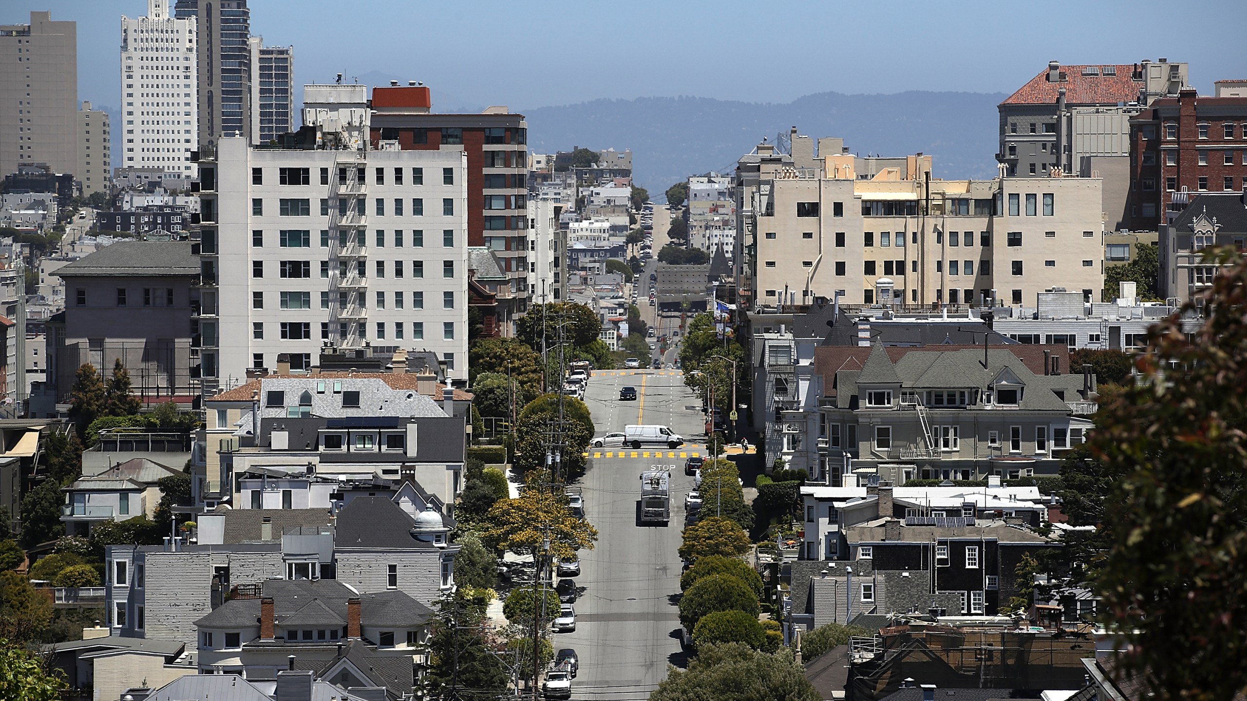 A view of homes and apartments on June 13, 2018 in San Francisco, California. According to a new survey by the National Low Income Housing Coalition, renters in San Francisco need an income of $60 per hour to afford a two bedroom apartment in the city. San Francisco is followed by San Jose at $48 per hour and Oakland at $45 per hour. (Credit: Justin Sullivan/Getty Images)