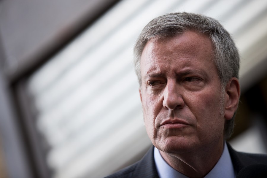 New York City Mayor Bill de Blasio speaks to the press following a visit to the Cayuga Center in East Harlem, a facility currently accepting children separated from their families at the southern border, June 20, 2018 in New York City. (Credit: Drew Angerer/Getty Images)