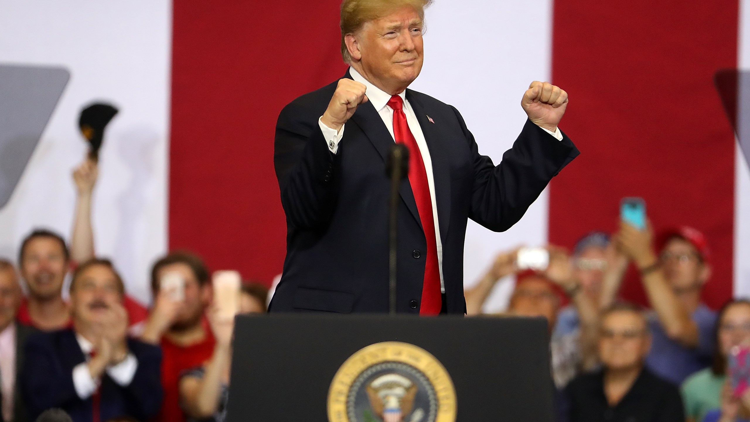 Donald Trump greets supporters during a campaign rally at Scheels Arena on June 27, 2018 in Fargo, North Dakota. (Credit: Justin Sullivan/Getty Images)