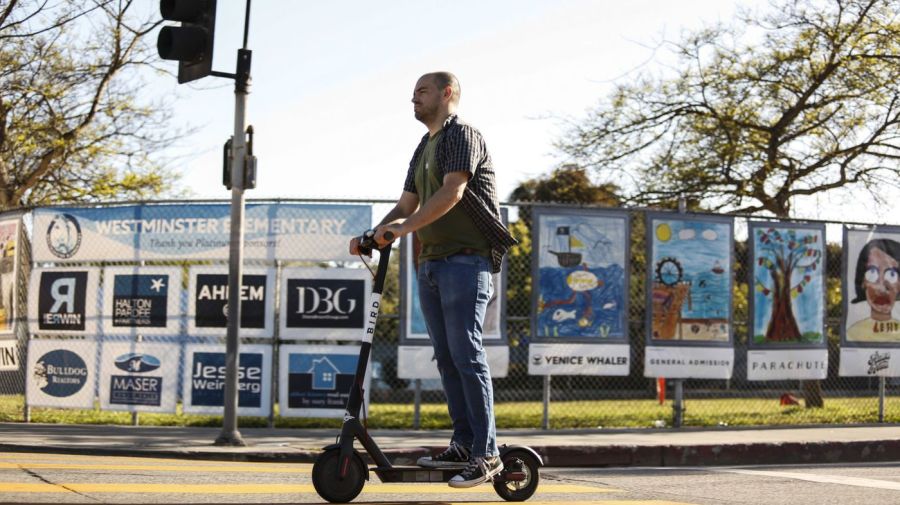 An undated photo shows a man using a rental scooter in Santa Monica. (Credit: Maria Alejandra Cardona / Los Angeles Times)