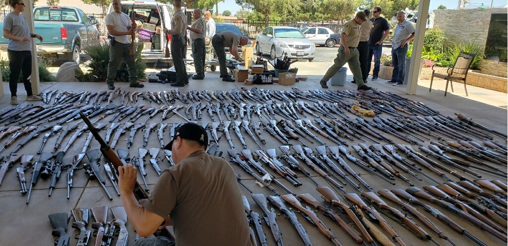 The Los Angeles County Sheriff's Department on June 18, 2018 provided this image of deputies seizing firearms from a home in Agua Dulce.