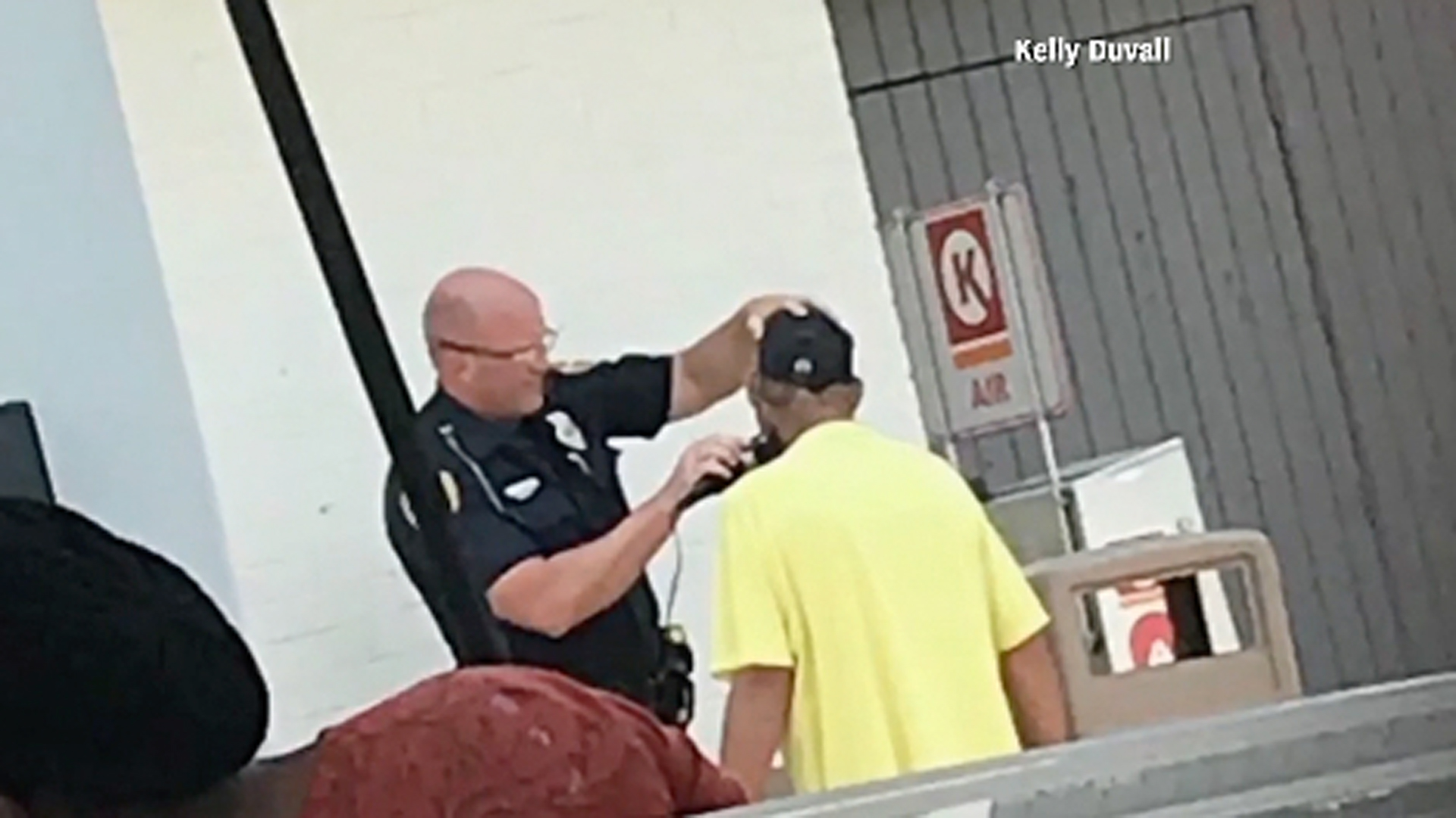 A Florida officer helped a man get a clean shave so he could land a job. (Credit: Kelly Duval via CNN Wire)