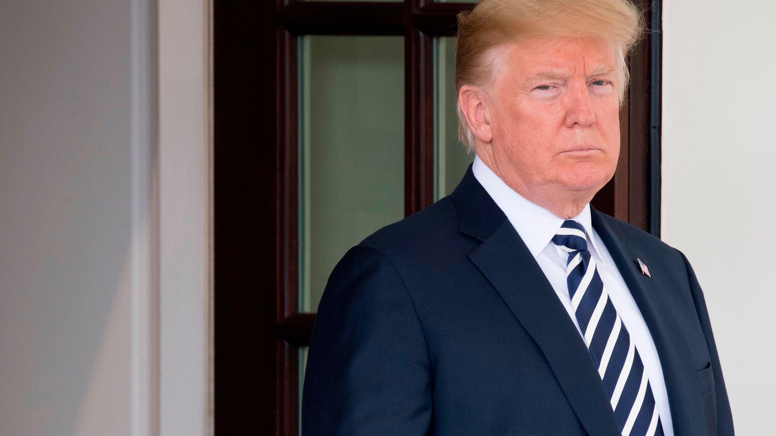 Donald Trump awaits the arrival of Italian Prime Minister Giuseppe Conte at the White House on July 30, 2018. (Credit: Jim Watson/AFP/Getty Images)