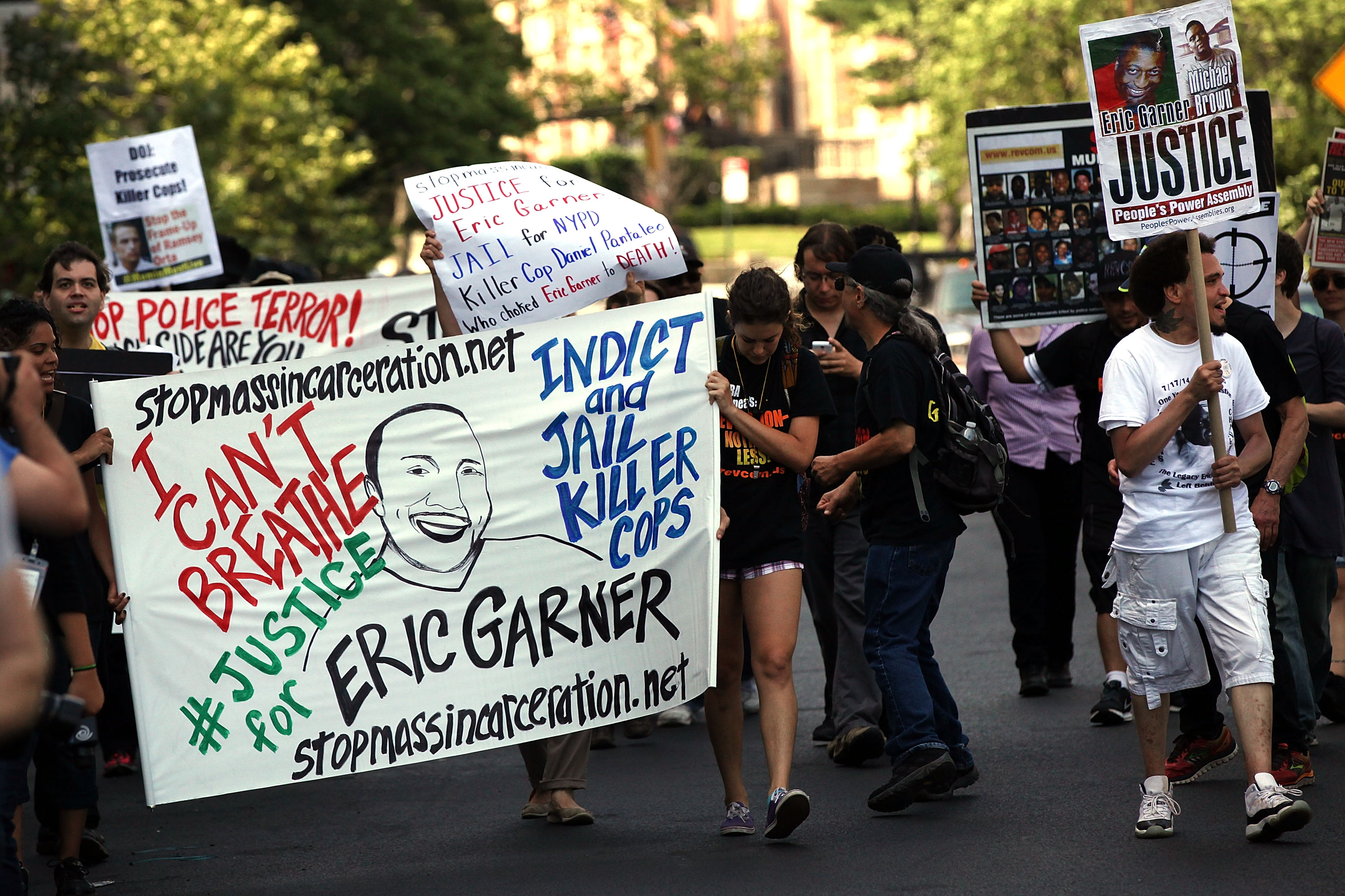 People protest in Staten Island on the one year anniversary of the death of Eric Garner on July 17, 2015 in New York City. (Credit: Spencer Platt/Getty Images)