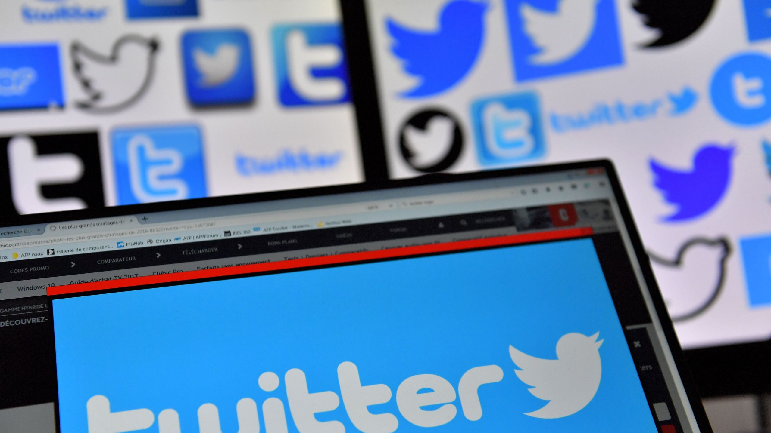 A picture taken on November 20, 2017, shows logos of U.S. online news and social networking service Twitter displayed on computers' screens.(Credit: Loic Venance /AFP/Getty Images)