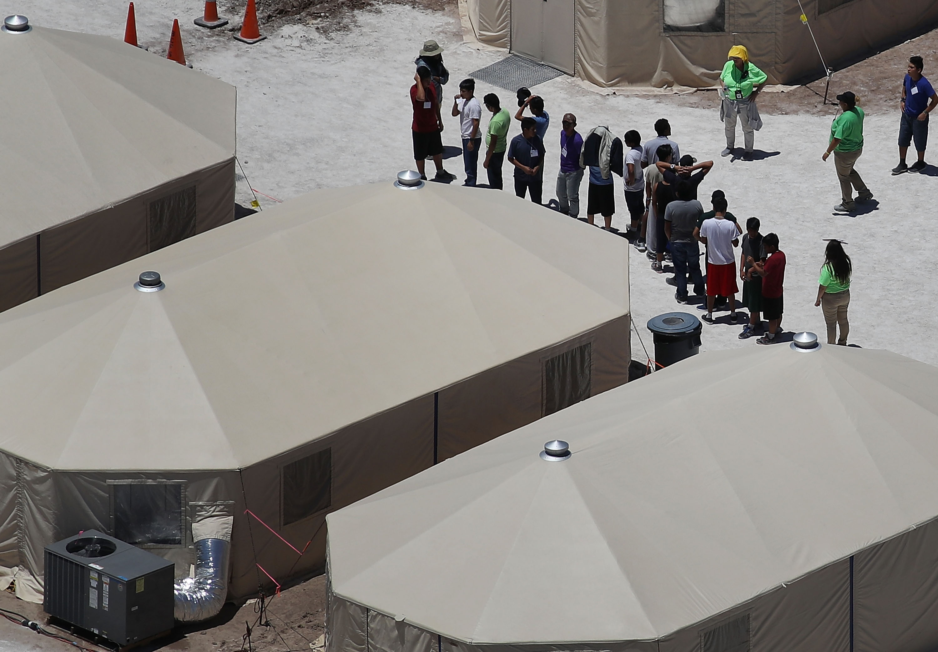 Children and workers are seen at a tent encampment built near the Tornillo Port of Entry in Texas on June 19, 2018. (Credit: Joe Raedle / Getty Images)