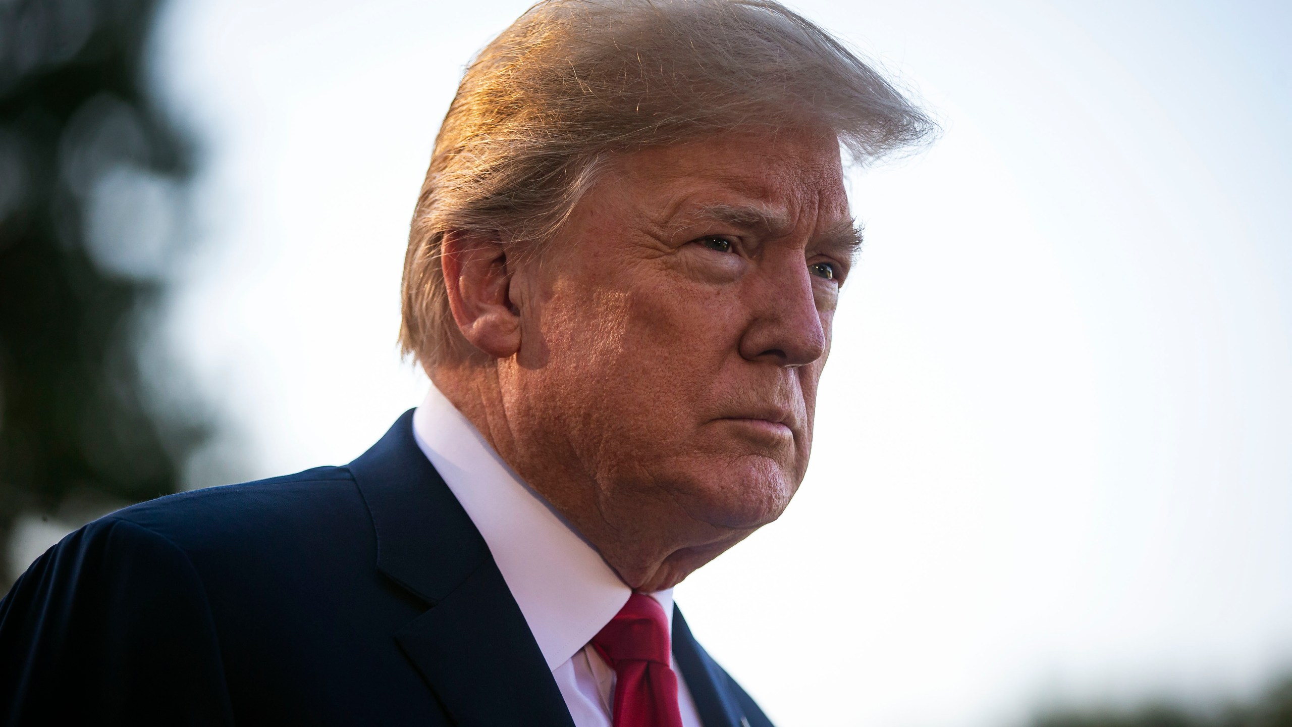 U.S. President Donald Trump speaks to reporters on the South Lawn before boarding Marine One and departing the White House, on July 9, 2018 in Washington, DC. (Credit: Al Drago/Getty Images)