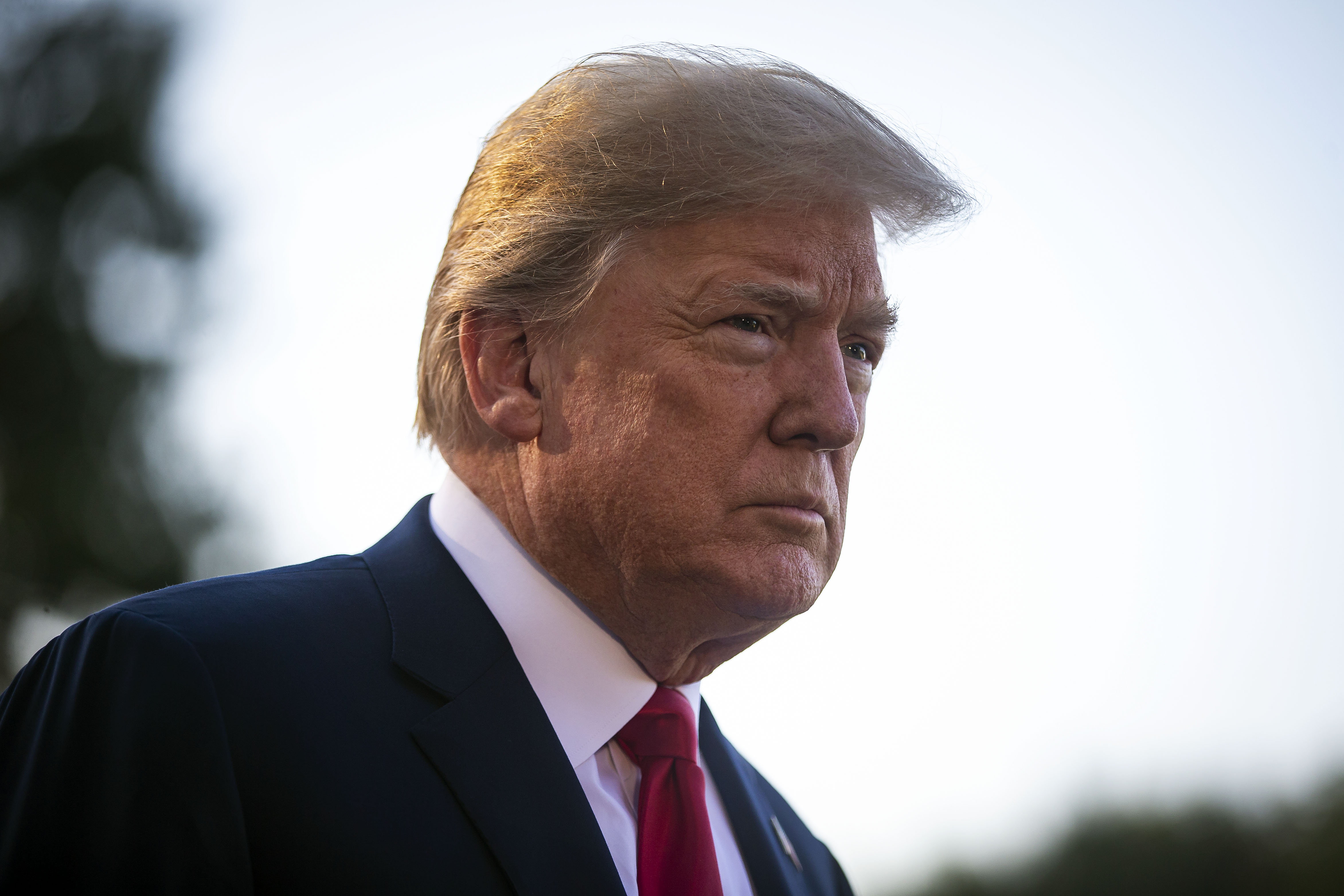 U.S. President Donald Trump speaks to reporters on the South Lawn before boarding Marine One and departing the White House, on July 9, 2018 in Washington, DC. (Credit: Al Drago/Getty Images)