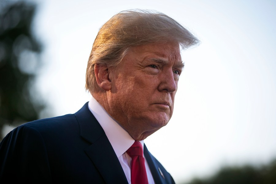 U.S. President Donald Trump speaks to reporters on the South Lawn before boarding Marine One and departing the White House, on July 9, 2018 in Washington, DC. (Credit: Al Drago/Getty Images)