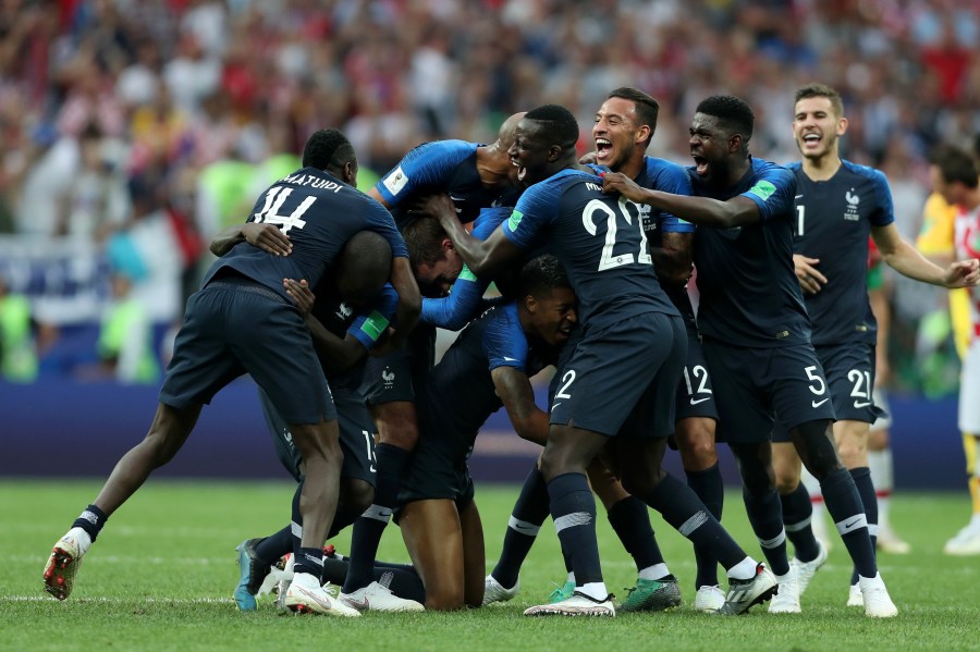 France players celebrate following their victory in the 2018 FIFA World Cup Final between France and Croatia at Luzhniki Stadium on July 15, 2018 in Moscow, Russia. (Credit: Clive Rose/Getty Images)