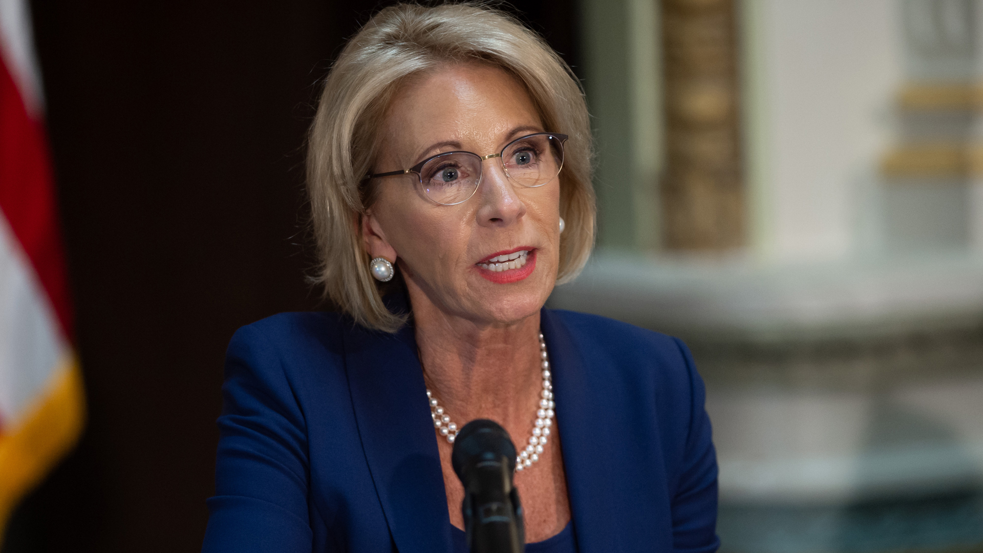 U.S. Secretary of Education Betsy DeVos speaks during the fifth meeting of the Federal Commission on School Safety, focusing on the best practices for school security, active shooter training for schools and dealing with school-based threat assessment, in the Eisenhower Executive Office Building next to the White House in Washington, D.C., Aug. 16, 2018. (Credit: Saul Loeb/AFP/Getty Images)