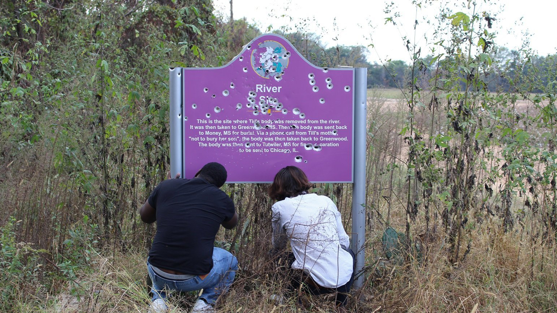 The second version of the memorial sign, riddled in bullet holes, is seen in 2016. (Credit: Emmett Till Interpretive Center via CNN)