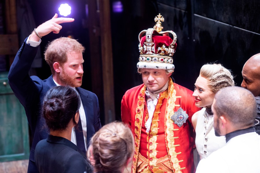 Meghan, Duchess of Sussex (L) and Prince Harry, Duke of Sussex meet the cast and crew of 'Hamilton' backstage after the gala performance in support of Sentebale at Victoria Palace Theatre on August 29, 2018 in London, England. (Credit: WPA Pool/Getty Images)