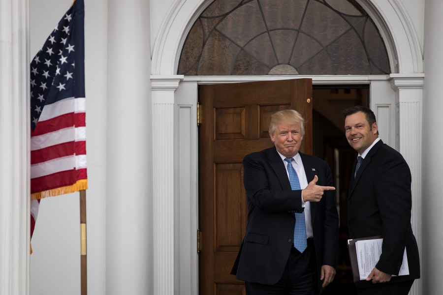 Donald Trump and Kris Kobach appear at Trump International Golf Club on Nov. 20, 2016 in Bedminster Township, New Jersey. (Credit: Drew Angerer/Getty Images)